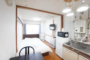 Virtuvė arba virtuvėlė apgyvendinimo įstaigoje NEAR Sapporo St & Hokkaido University Cozy studio sanwa101