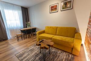 Posedenie v ubytovaní Bison Apartamenty