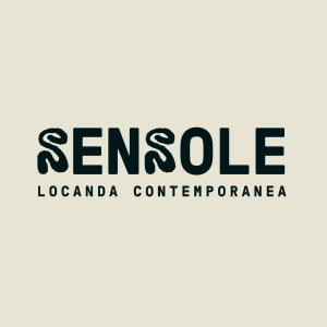 a sign that reads senselele laconda confederation at Sensole locanda contemporanea in Monte Isola