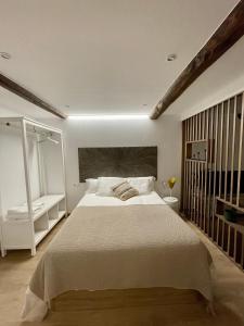 เตียงในห้องที่ A Das Marias LOFT