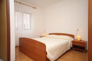Postel nebo postele na pokoji v ubytování Apartments and rooms with parking space Metajna, Pag - 4120