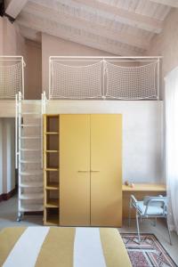 Postel nebo postele na pokoji v ubytování LABottega - Camere