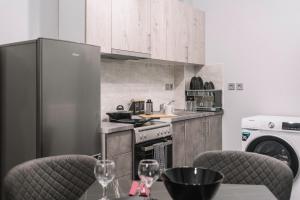 Kuchnia lub aneks kuchenny w obiekcie Dream Apartment "self check in"