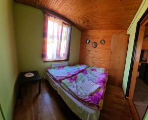 Posteľ alebo postele v izbe v ubytovaní Chata Kika - ubytovanie na súkromí