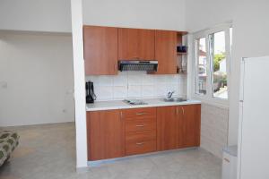 Kuchyň nebo kuchyňský kout v ubytování Apartments with a parking space Njivice, Krk - 5458
