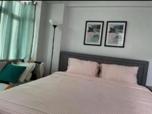 Postel nebo postele na pokoji v ubytování F-10C Parkside Villas