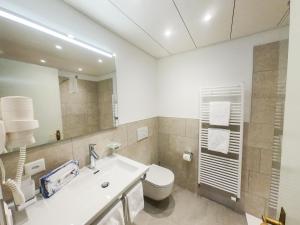 Ένα μπάνιο στο Hotel La Perla
