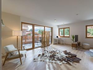 Posezení v ubytování Apartment Hideaway - Stylisch, ruhig, Topausstattung, Infrarotsauna, Dachterrasse
