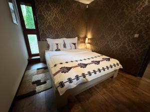 Posteľ alebo postele v izbe v ubytovaní Apartament M5 Zakopane