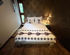 Posteľ alebo postele v izbe v ubytovaní Apartament M5 Zakopane