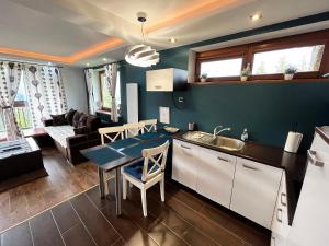 Posedenie v ubytovaní Apartament M5 Zakopane