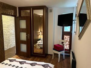 Posteľ alebo postele v izbe v ubytovaní Apartament M5 Zakopane