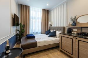 Posteľ alebo postele v izbe v ubytovaní AR Apartamenty