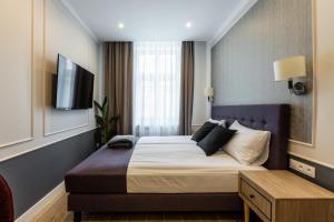Posteľ alebo postele v izbe v ubytovaní AR Apartamenty