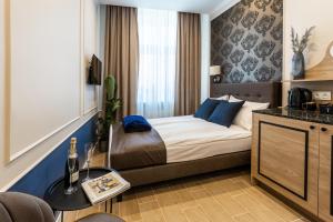 Posteľ alebo postele v izbe v ubytovaní AR Apartamenty