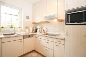 Fotografie z fotogalerie ubytování Ferienwohnung Lille Huus v destinaci Krummhörn + 12 fotografií
