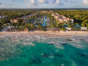 an aerial view of the resort and the ocean at Ocean Blue & Sand Beach Resort - All Inclusive in Punta Cana