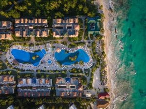 an aerial view of a resort on the beach at Ocean Blue & Sand Beach Resort - All Inclusive in Punta Cana
