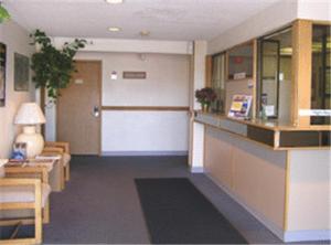 a hallway of a hospital with a waiting room at Colorado River Value Inn in Bullhead City