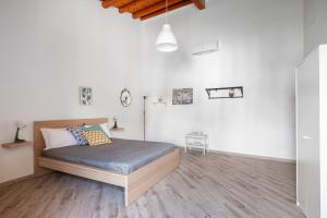 Posteľ alebo postele v izbe v ubytovaní Danisinni Rooms by Wonderful Italy