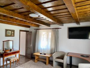 TV a/nebo společenská místnost v ubytování Casa Vasu