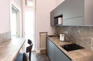 A kitchen or kitchenette at Household Settembrini