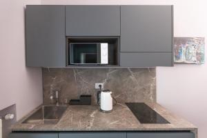 A kitchen or kitchenette at Household Settembrini