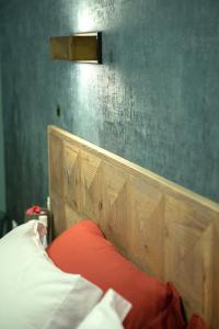 A bed or beds in a room at Household Settembrini