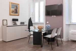 A television and/or entertainment centre at Household Settembrini