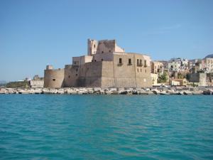 a view of a castle from the water at Casetta sull'Albero, Girasole in Castellammare del Golfo