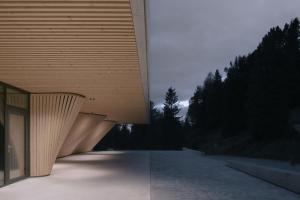 an external view of a building with wood panels at anders mountain suites 6 in Brixen