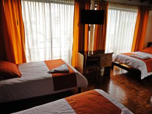 Letto o letti in una camera di Hotel Rincón Escandinavo