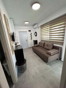 A seating area at Apartments M, Kallikratia