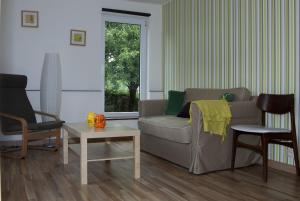 Posezení v ubytování B&B Die Alte Scheune