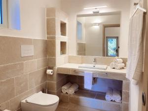 A bathroom at Gattarella Family Resort Puglia- Seaside Rooms and Suites with Premium Half-Board à la carte