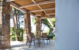 A balcony or terrace at Gattarella Family Resort Puglia- Seaside Rooms and Suites with Premium Half-Board à la carte