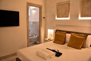 A bathroom at Gattarella Family Resort Puglia- Seaside Rooms and Suites with Premium Half-Board à la carte