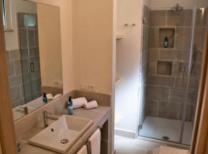 A bathroom at Gattarella Family Resort Puglia- Seaside Rooms and Suites with Premium Half-Board à la carte