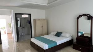 Postel nebo postele na pokoji v ubytování Aw Hotel Acawa Resort & Piscina