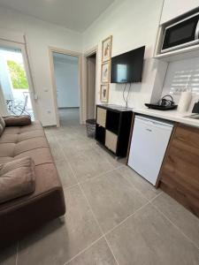 A kitchen or kitchenette at Apartments M, Kallikratia