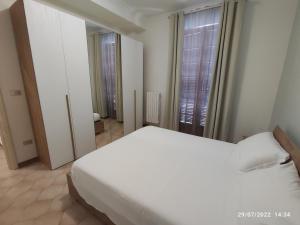 Postel nebo postele na pokoji v ubytování B&B dell'Assunta