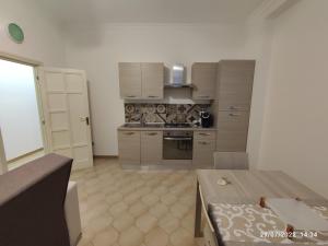 Kuchyň nebo kuchyňský kout v ubytování B&B dell'Assunta