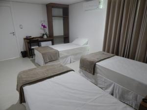 Кровать или кровати в номере Pousada Gaia