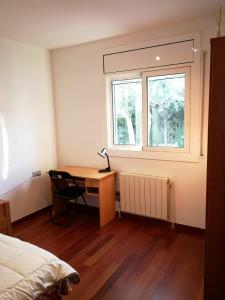 Posteľ alebo postele v izbe v ubytovaní Villa Playa y Montaña