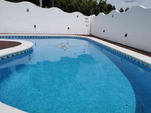 Bazén v ubytovaní Villa Playa y Montaña alebo v jeho blízkosti