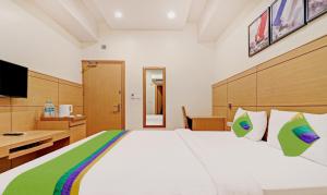 TV a/nebo společenská místnost v ubytování Treebo Galaxy Rooms