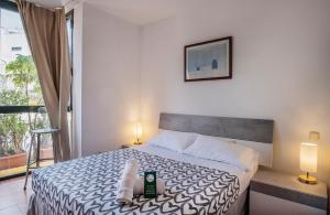 Postel nebo postele na pokoji v ubytování Hotel Doña Matilde