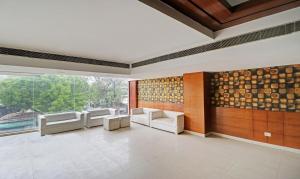 Posezení v ubytování Treebo Galaxy Rooms