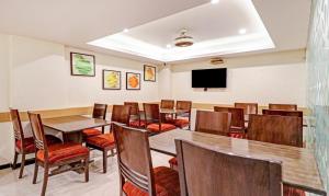 TV a/nebo společenská místnost v ubytování Treebo Galaxy Rooms