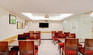TV a/nebo společenská místnost v ubytování Treebo Galaxy Rooms